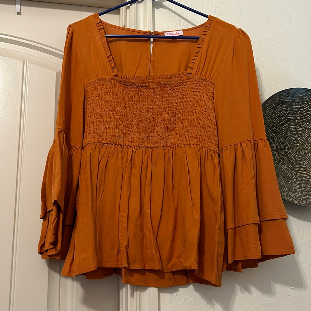 Orange flutter top